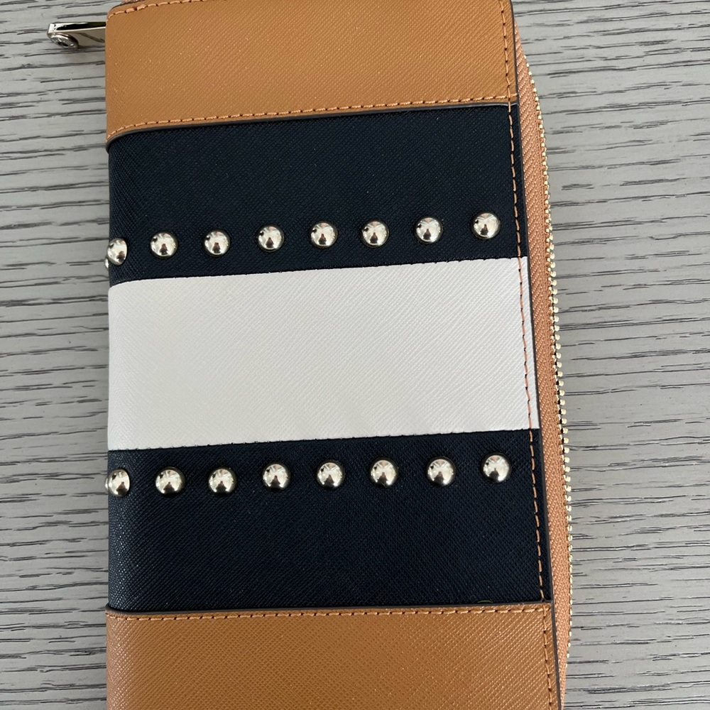 Henri Bendel never used Wallet. Tan and black with studs.$89 was $188